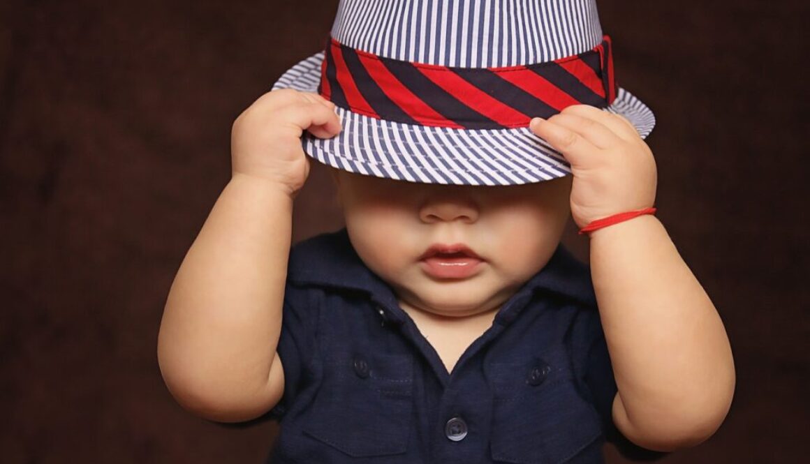 baby boy hat covered child 1399332